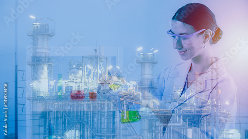 scientist in laboratory.  double exposer scientist on  Chemical factory background.