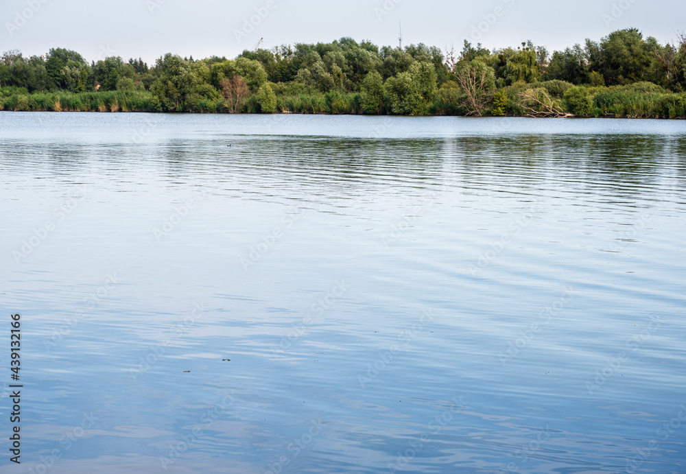 Summer hazy day on picturesque lake Summer hazy day on picturesque lake