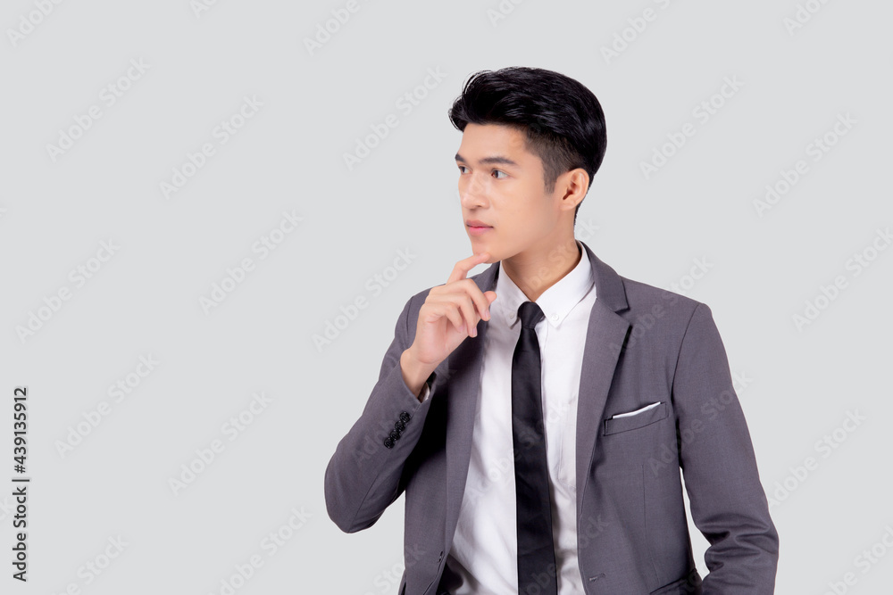 Portrait young asian business man in suit with smart thinking idea isolated on white background, businessman standing and planning for success, handsome manager or executive, emotion and expression. Portrait young asian business man in suit with smart thinking idea isolated on white background, businessman standing and planning for success, handsome manager or executive, emotion and expression.