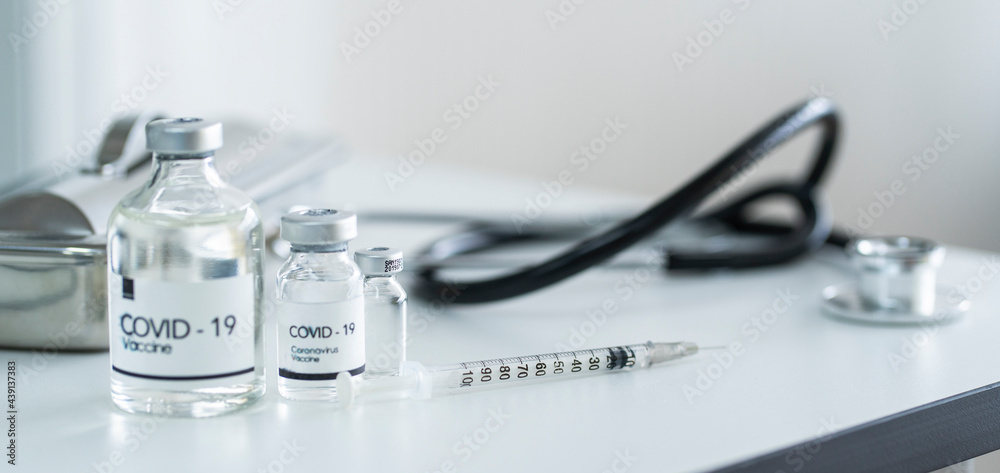 lVaccine bottle, syringe, stethoscope
