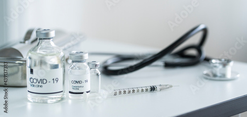 lVaccine bottle, syringe, stethoscope