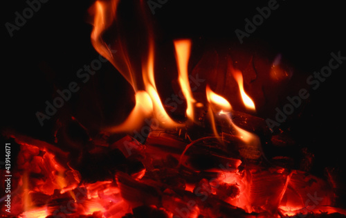 Fire in the fireplace close-up on a long exposure. Background.