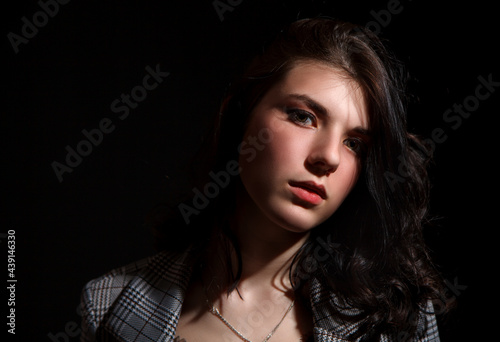portrait of a young beautiful girl in the studio