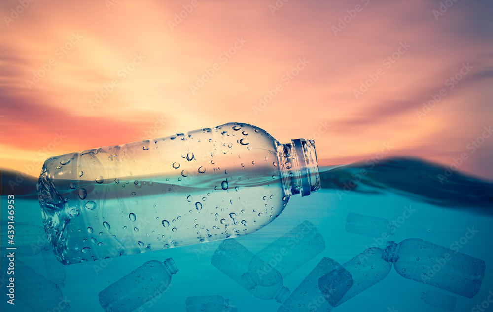 Plastic bottles float in the sea. Plastic waste floats in the water. plastic waste change your