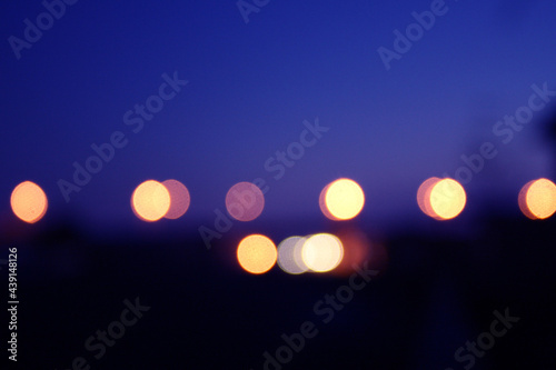 blur bokeh sky at sunset and lamp background. © lim_pix