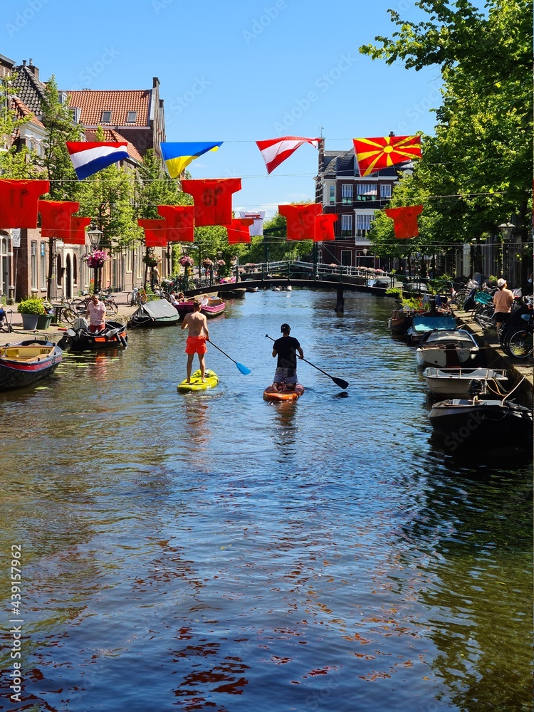 Celebrating football championship, canals in Leiden, Netherlands 