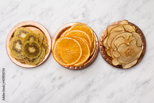 Different dried fruits heap on the table photo