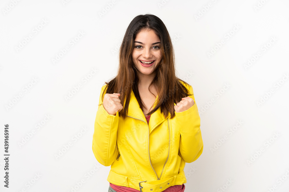 Young caucasian woman isolated on white background celebrating a victory in winner position Young caucasian woman isolated on white background celebrating a victory in winner position
