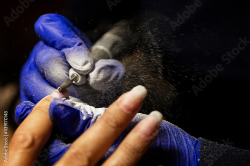 Hardware manicure in the salon. Close-up.