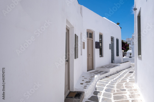 Fototapeta Naklejka Na Ścianę i Meble -  Mykonos, Greece. Traditional whitewashed buildings and narrow streets,