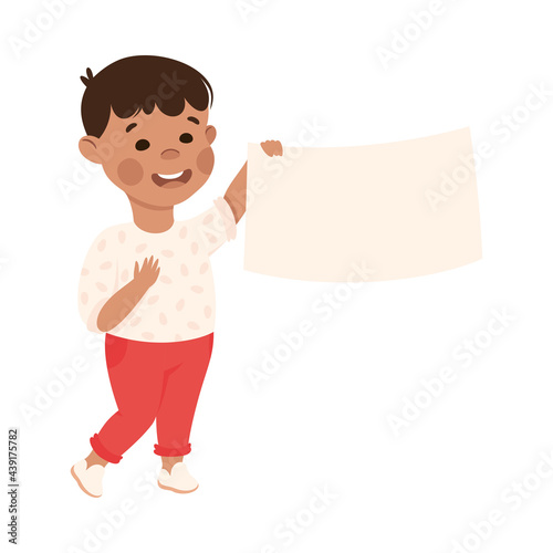 Little Boy Standing and Holding Empty Rectangular Plaque Vector Illustration © topvectors