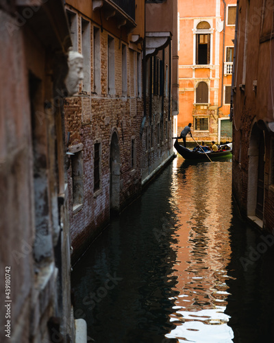 Venice Canal with Gondola Driver Kicking Off
