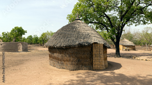 Grass hut northern Ghana bush village Africa. Northern region of Ghana. Rural traditional mud and straw huts and buildings. Poverty economy. African tribal and native homes.