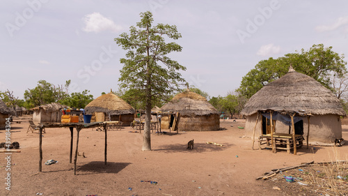 North Ghana traditiona bush grass hut village Panorama. Northern region of Ghana. Rural traditional mud and straw huts and buildings. Poverty economy. African tribal and native homes.