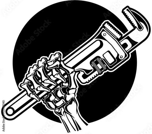 human skeleton hand holding wrench 