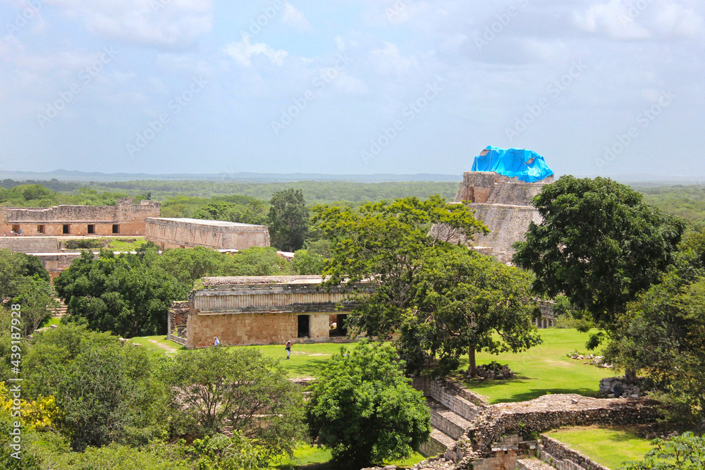 Fototapeta premium Uxmal, aerial view on Nunnery and the Pyramid of the Magician, view from the top of Great Pyramid situated on the territory of Uxmal archeological and historical site, Yucatan, Mexico