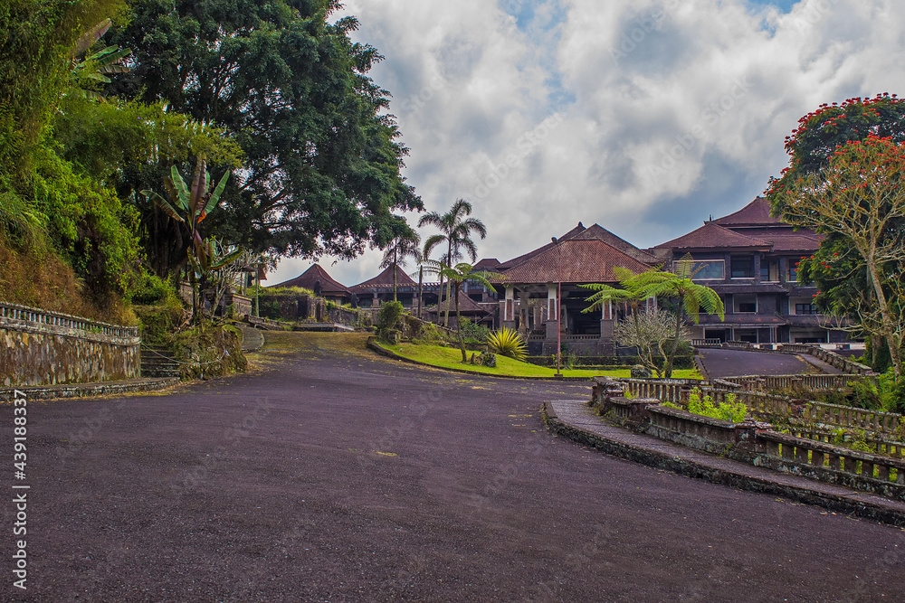 The territory of an abandoned hotel Bedugul Taman Rekreasi Hotel & Resort (also known as Ghost Palace Hotel). Ruins of Balinese hotel is famous landmark for tourists