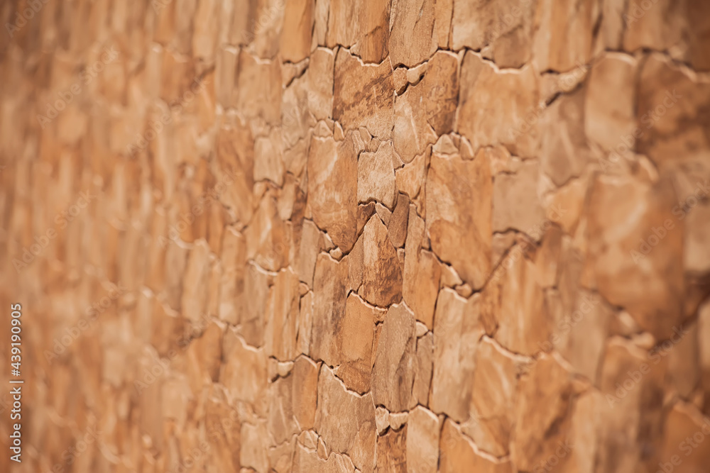 Stone wall surface. Block facade background Stone wall surface. Block facade background