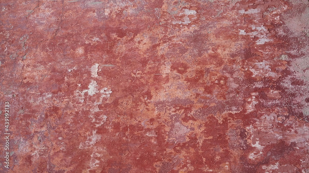 closeup of a distressed wall in pink and red shades closeup of a distressed wall in pink and red shades
