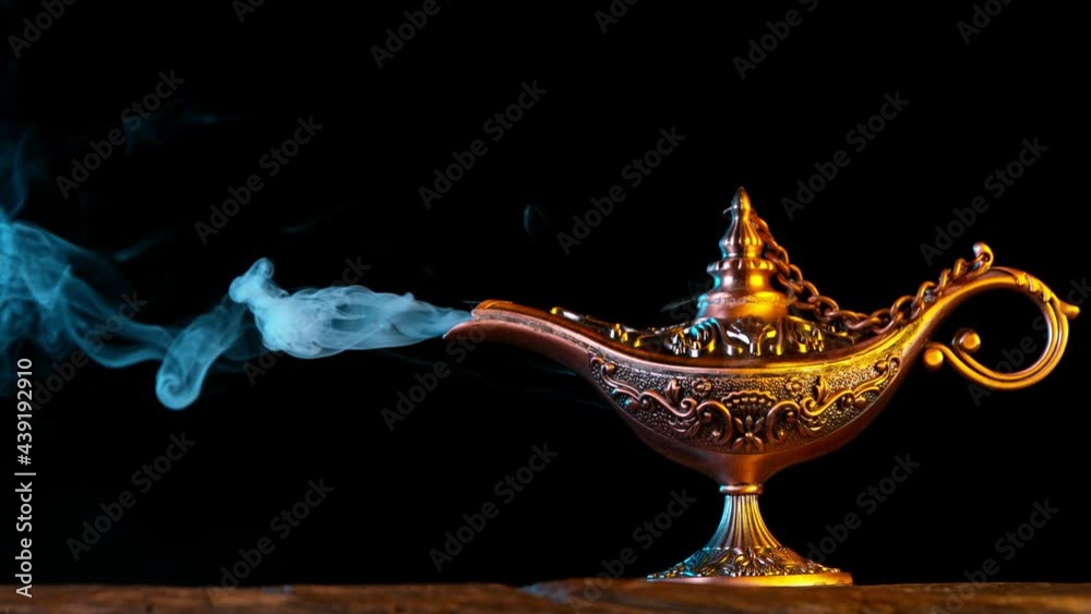 Super Slow Motion of Antique Oriental Aladdin Arabian lamp with Soft Light Smoke. Lamp of Wishes. Filmed on High Speed Cinematic Camera.