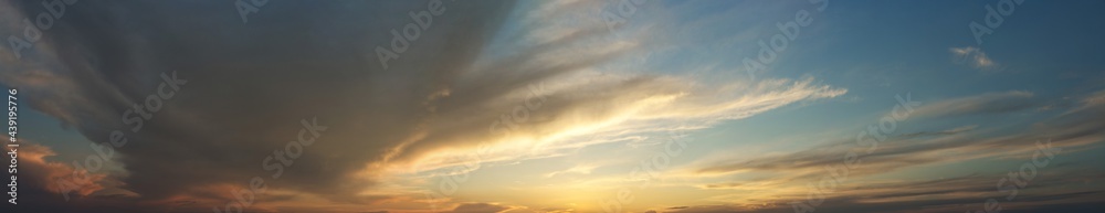 Beautiful atmospheric dramatic clouds in the evening at sunset.