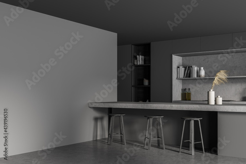Dark kitchen interior with table and bar chairs, mockup