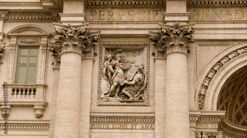 Rome, Trevi neighborhood. Detail of Palazzo Poli, backdrop of Trevi Fountain. Sculpture of Marco Agrippa ordering the construction of the aqueduct.