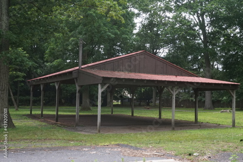 Pavillion in Park with Green Trees in Shade