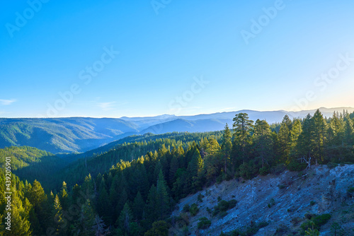 Scenic View of Northern California mountains at sunrise with blue skies 