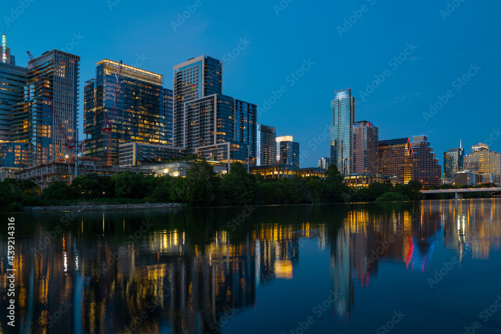 Downtown Skyline of Austin, Texas in USA. Austin Sunset on the Colorado River. Night sunset city.