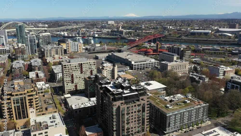 Cinematic aerial 4K drone shot of Portland near Pearl, Lloyd Districts, Nob Hill, Buckman Neighborhood, King's Heights, Willamette River, Tom McCall Waterfront Park, skyscrapers, cityscape in Oregon Cinematic aerial 4K drone shot of Portland near Pearl, Lloyd Districts, Nob Hill, Buckman Neighborhood, King's Heights, Willamette River, Tom McCall Waterfront Park, skyscrapers, cityscape in Oregon