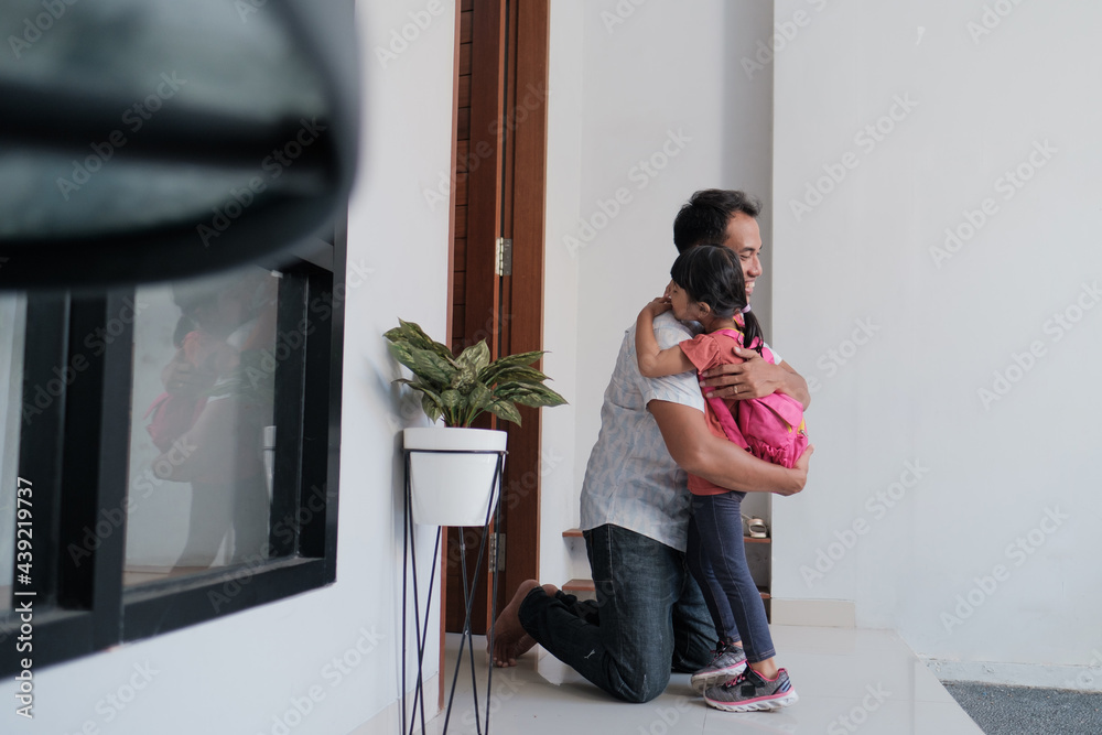 portrait of asian happy father welcoming his kid after finishing school portrait of asian happy father welcoming his kid after finishing school