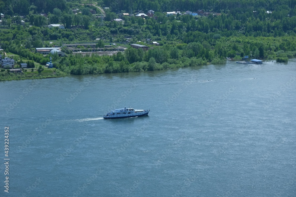 Obraz premium The boat on river on Yenisey, Krasnoyarsk, Russia.