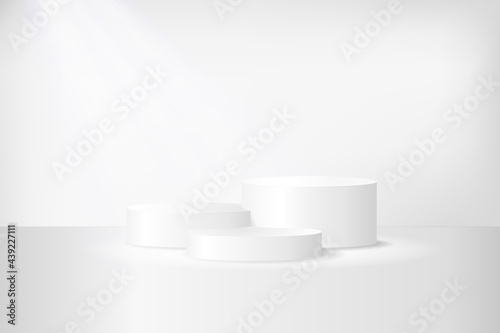 Three-level white podium on white background with reflection. Three simple cylinder geometric pedestals for product presentation. Realistc vector, 3d illustration