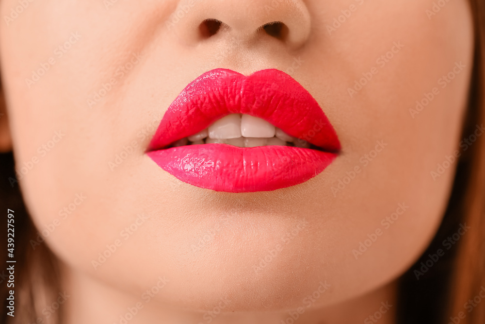 Beautiful young woman with bright lipstick, closeup Beautiful young woman with bright lipstick, closeup