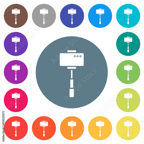 Smartphone on selfie stick back view flat white icons on round color backgrounds
