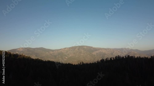 Drone footage of the High Sierras in the Sequoia National Forest.  Hiking and camping among the pine trees in the California mountain range. photo
