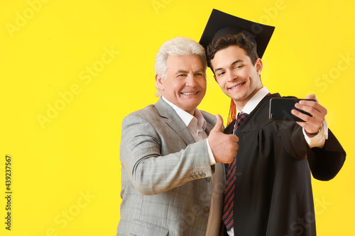 Happy male graduation stude...