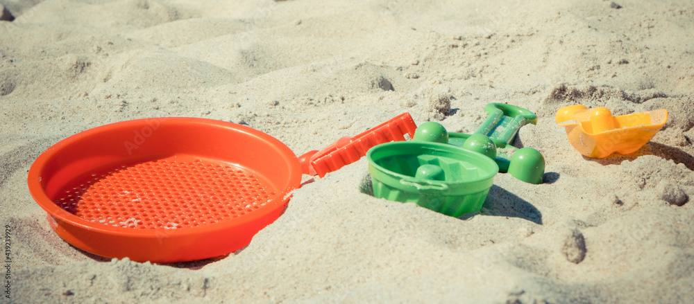 Children toys for relax or playing on sand at beach. Vacation time Children toys for relax or playing on sand at beach. Vacation time