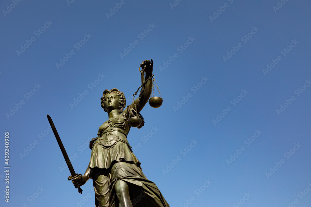 lady justice with sword and scale