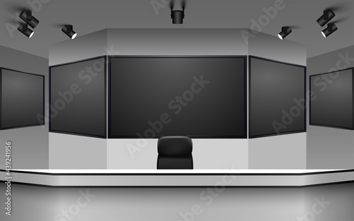 white table and lcd background in a news studio room	
