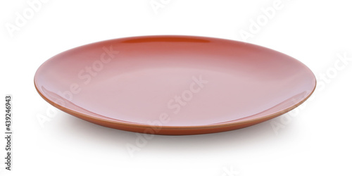 Light brown ceramic plate isolated on white background.