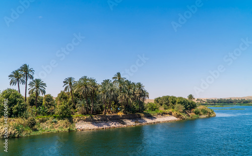 Panoramic view of fertile vegetation along the banks of the Nile River near Edfu, Egypt © Jack Krier