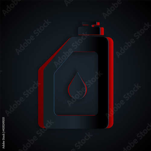 Paper cut Canister for motor machine oil icon isolated on black background. Oil gallon. Oil change service and repair. Engine oil sign. Paper art style. Vector