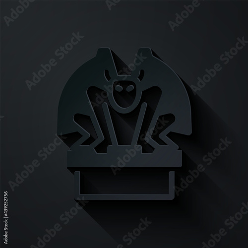 Paper cut Gargoyle on pedestal icon isolated on black background. Paper art style. Vector