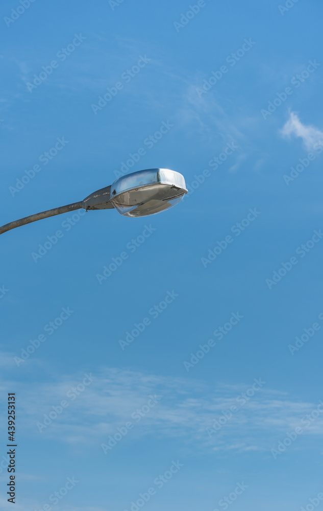 .Street lamp pole In the background is a beautiful sky