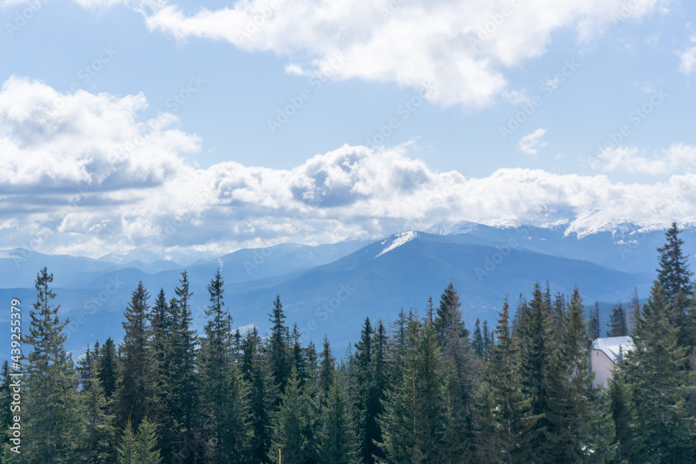 Landscape of carpathian mountains. Nature scenery in spring time with clouds on the sky Landscape of carpathian mountains. Nature scenery in spring time with clouds on the sky