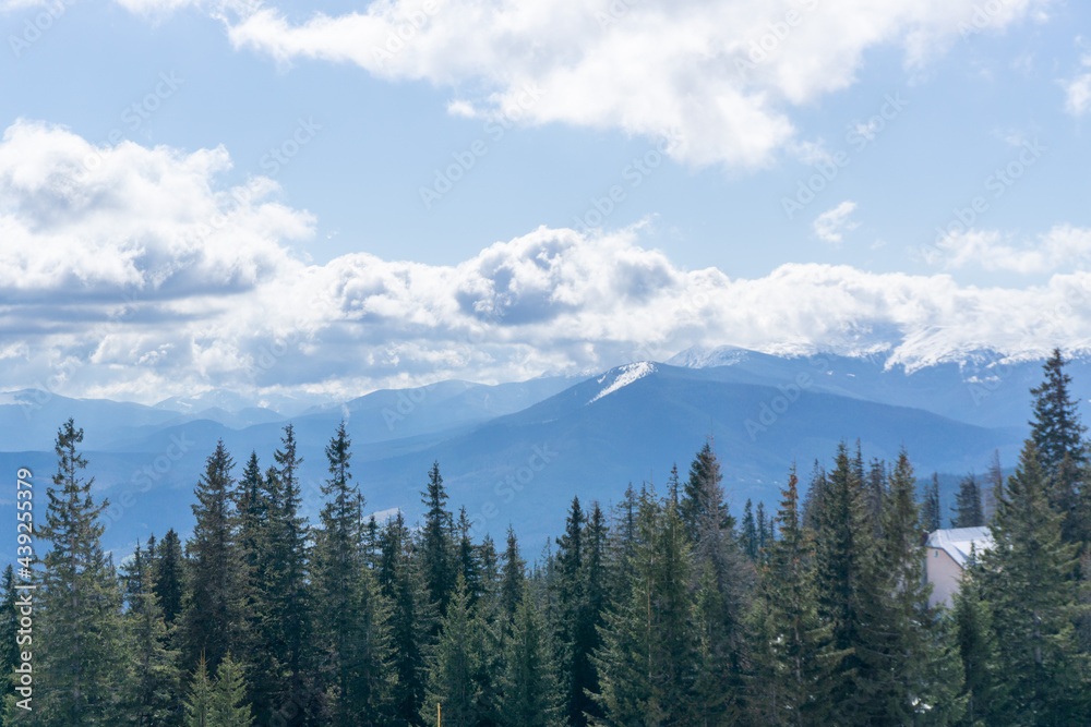 Landscape of carpathian mountains. Nature scenery in spring time with clouds on the sky