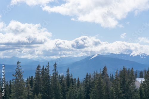 Landscape of carpathian mountains. Nature scenery in spring time with clouds on the sky