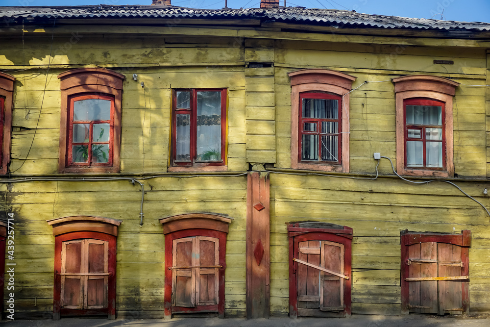 Fototapeta premium Shutters of windows of an old house in Irkutsk, Siberia